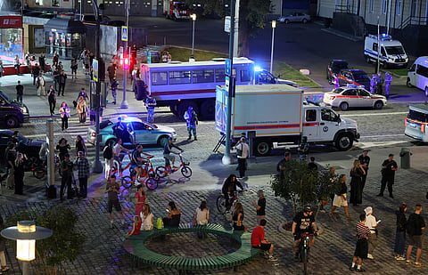 Law enforcement officers and emergency services personnel near the site of an explosion at a restaurant in central Moscow, Russia August 1, 2026.