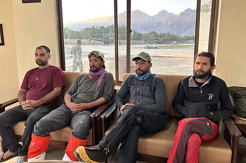 Members of a mountaineers rescue team prepare to depart from an airbase on a search operation for climbers missing after an avalanche on Pakistan's Broad Peak, in Skardu, in Gilgit-Baltistan's region, in northern Pakistan on Friday.