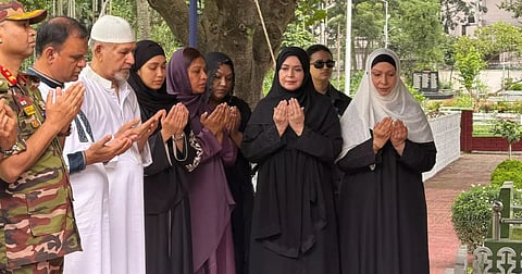 Dr Zubaida Rahman, Shahina Khan Zaman and Zaima Rahman offer prayers at the grave of former Bangladesh Navy Chief Rear Admiral Mahbub Ali Khan at Banani Military Graveyard on Thursday, marking his 42nd death anniversary.