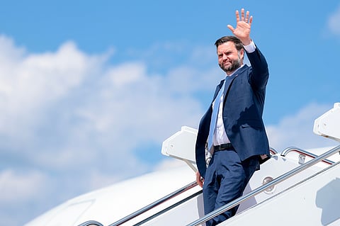 Vice President JD Vance waves as he disembarks Air Force Two at Joint Base Andrews, Md, following a trip to Maine, Monday, Aug 24, 2026.