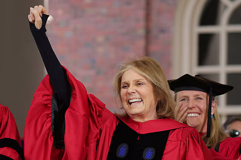 Gloria Steinem salutes the graduating students as she receives and honorary Doctor of Humane Letters during Harvard University's 371st Commencement Exercises in Cambridge, Massachusetts, US, May 26, 2022