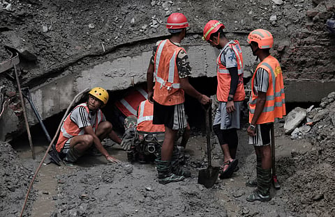 Rescuers search for survivors in Rasuwa, Nepal.