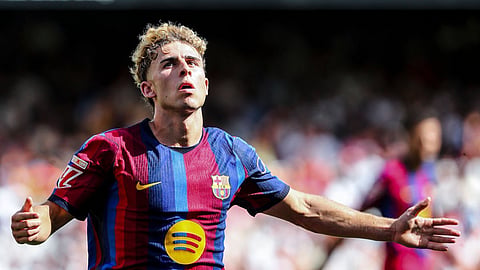 Barcelona's Fermin Lopez celebrates after scoring against Valencia in their Laliga match on Sunday.