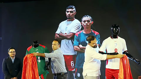 BFF president Tabith Awal and Youth and Sports State Minister Aminul Haque unveil the new jerseys of Bangladesh’s men’s and women’s football teams.