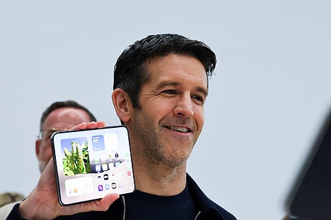 New Apple CEO John Ternus holds the new foldable iPhone Duo during Apple's event at the Steve Jobs Theater in Cupertino, California, U.S. September 9, 2026.