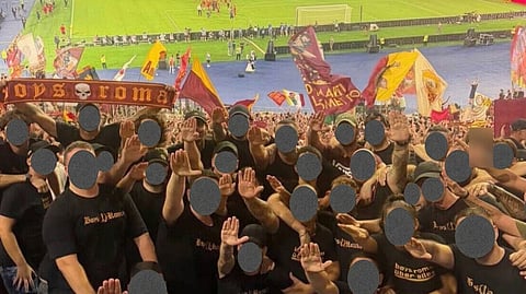 A section of Roma fans doing the controversial fascist salute.