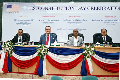 Speakers pose for a group photo at the seminar marking US Constitution Day and 250 years of American democracy at the University of Dhaka on Thursday.