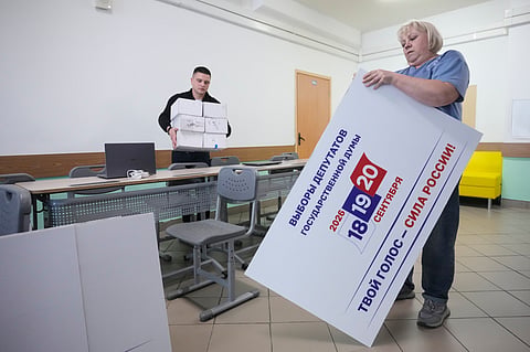 Precinct election commission members set up a polling station for the upcoming parliamentary elections in Moscow, on Thursday, Sept 17, 2026.