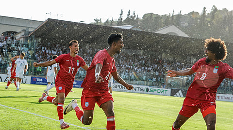 Bangladesh's Topu Barman (C) celebrates with Hamza Choudhury (R) after scoring against San Marino.