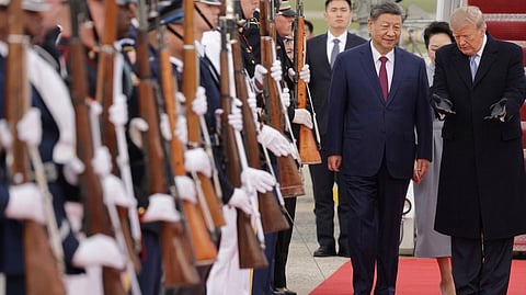 US President Donald Trump shows the way to Chinese President Xi Jinping as he arrives ahead of a state visit at Joint Base Andrews, Maryland, US, September 23, 2026.