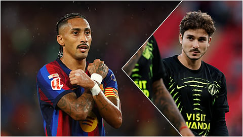 FC Barcelona's Raphinha and Atletico Madrid's Julian Alvarez.