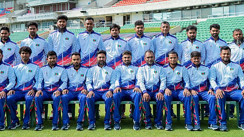 Bangladesh's cricket team pose for a group photo at the Sher-e-Bangla National Cricket Stadium in Mirpur before departing for Nagoya for the Asian Games.