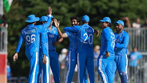Jasprit Bumrah (C) struck with the second ball of the innings, giving India an early breakthrough.