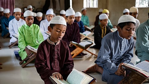 Students attend a class at Emdadul Ulum Islamia Madrasah in Shamlashi, Savar.