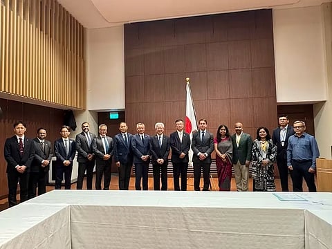 Japanese Ambassador to Bangladesh Saida Shinichi and other officials pose for a photograph after signing a grant agreement with icddr,b to expand mobile tuberculosis screening in Dhaka’s slum areas.