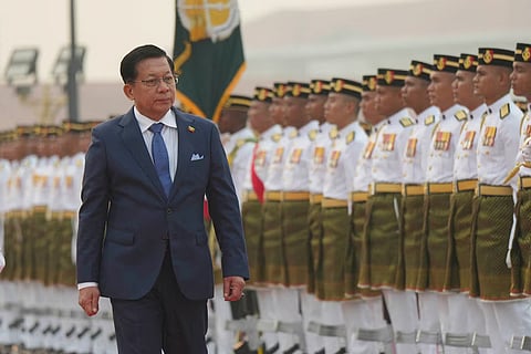 Myanmar’s President Min Aung Hlaing inspects an honor guard during a welcoming ceremony ahead of his meeting with Malaysia’s Prime Minister Anwar Ibrahim at the Prime Minister’s Office in Putrajaya, Malaysia, Thursday, Oct. 8, 2026