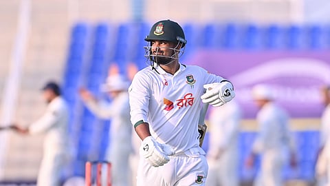 Bangladesh batter Litton Das walks back disappointed after his dismissal late on Day 1 of the one-off Test against Afghanistan at the UAE on Friday.