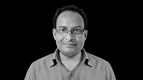 A photo of journalist Amir Khasru