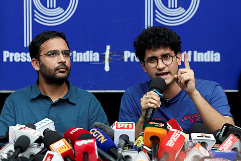 Saurav Das, chief spokesperson of the Cockroach Janta Party (CJP), speaks next to Ashutosh Ranka, co-convenner of CJP, during a press conference at the Press Club of India following their release, amid protests demanding the resignation of India's Chief Election Commissioner Gyanesh Kumar, in New Delhi, India, October 11, 2026