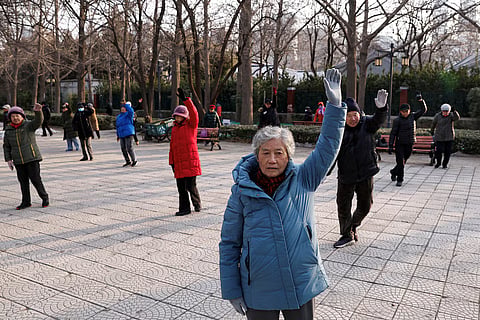 Elderly people dance at a park in Beijing, China January 16, 2024.