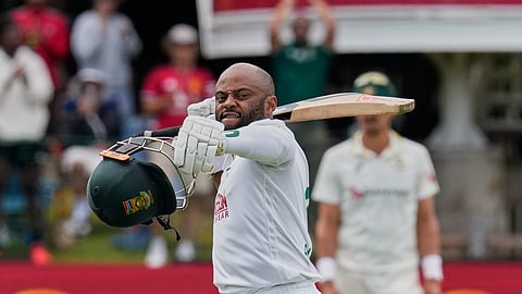 South Africa captain Temba Bavuma celebrates after completing his century.