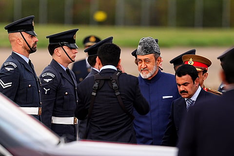 The Sultan of Oman, Sultan Haitham bin Tarik, center right, arrives at Stansted Airport, Stansted, England, Monday Oct 19, 2026.