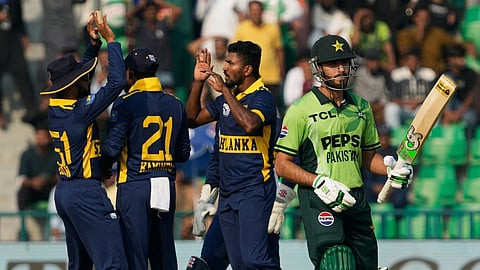 Pakistan’s Arafat Minhas walks off after being dismissed by Sri Lanka’s Dilshan Madushanka in the tri-series ODI in Lahore on October 27, 2026.