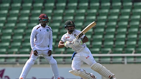 Bangladesh batters Shadman Islam plays a shot on Day 1 of the first Test against West Indies at the Sher-e-Bangla National Cricket Stadium in Dhaka on Wednesday.