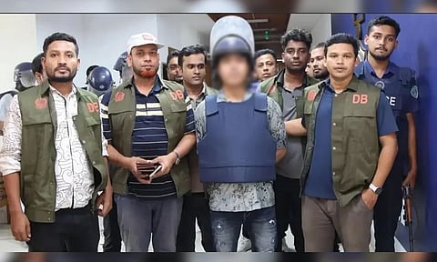 Mobarak Hossain Emon, alias “David Emon”, is taken to a Chattogram court under tight security on Wednesday.