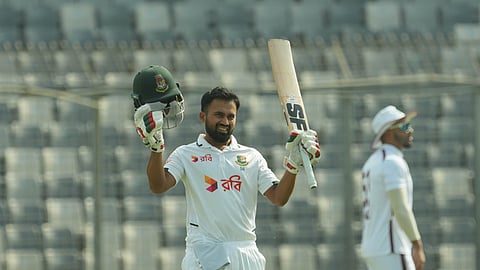 Shadman Islam celebrates after scoring a century against West Indies on day two of the first Test in Mirpur.