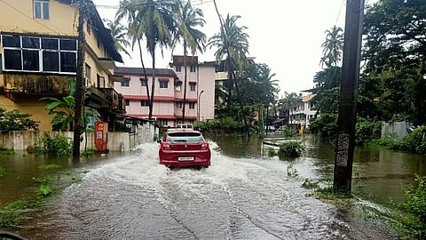 After heavy rains lashed Goa,  Car finds the way through the water in the Area of Taleigao, on Friday, 15 july, 2021