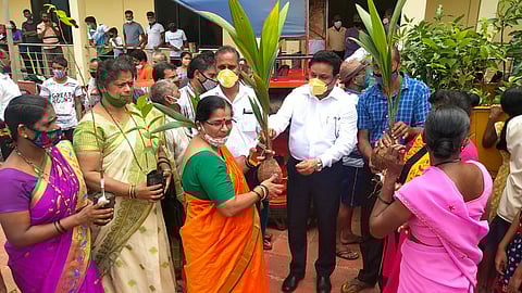 MLA Sopte while distributing the tree at Tuem, Goa