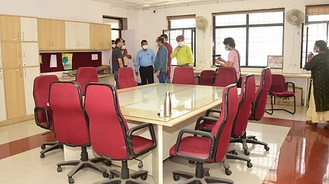 Goa: Mahadev Naik inspecting a school in Delhi. Along with Aam Aadmi Party members.