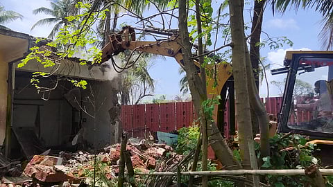 Goa : Government machinery while demolishing a building constructed in violation of CRZ rules at Bamanwada Candolim Goa.