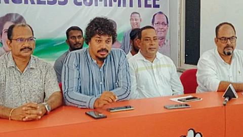 South Goa Congress president Savio D'Silva in the center while speaking at the press conference
