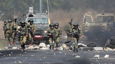 Hamas leader Musa Abu Marzouk said, "We are ready to discuss a ceasefire with Israel."