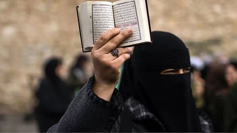 Muslim Woman Burnt Quran