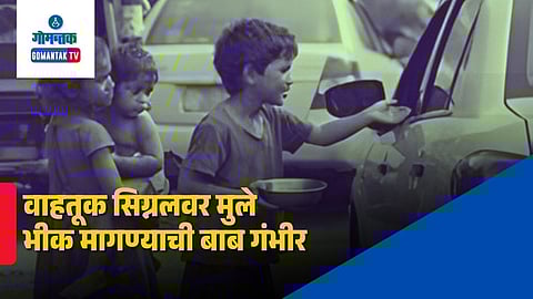 Child begging at Goa traffic signals