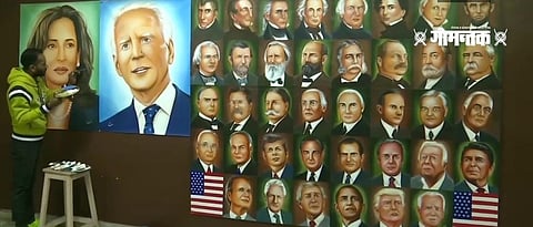 An artist from Amritsar paints a picture of US President Joe Biden and Vice President Kamala Harris