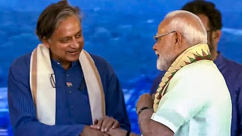 Modi meets Tharoor