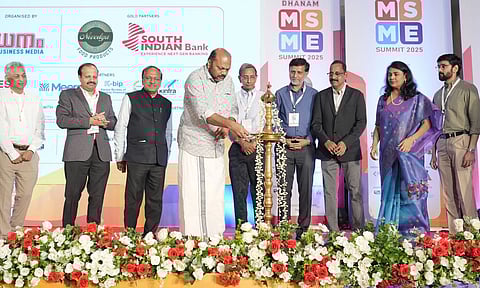 Industries minister P Rajeev inaugurates the Dhanam MSME Summit. Also seen are Dhanam Business Media chief editor and chairman Kurian Abraham, executive editor and director Maria Abraham, director and vice president Vijay Kurian Abraham, Manappuram Finance managing director VP Nandakumar, TiE Kerala president Vivek Krishna Govind, Thrissur Management Association president Padmakumar, Thrissur Chamber of Commerce president Sajive Manjila, and franchise expert Chackochan Mathai.