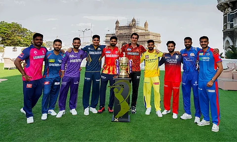 captains of ipl teams posing with ipl trophy