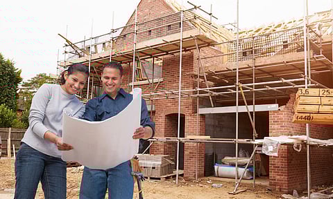 Building a house, a couple watching
