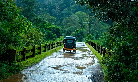 Rain auto rikshaw in a bridge