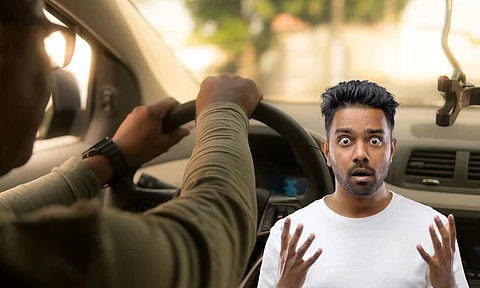 Uber taxi and man in shock