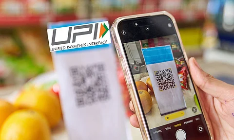 UPI transaction in a shop, UPI logo