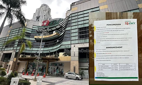 Photo of the Lulu Hypermarket & Department Store at CapSquare, Kuala Lumpur, with an overlay showing the official closure notice. The notice, in both Malay and English, announces the store’s operations will cease from 9 June 2025. Contact details of Lulu management are included for customer assistance.