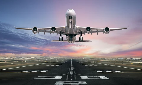 an Aero plane landing on a runway