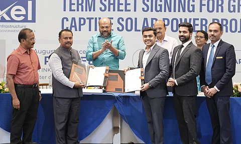 HiLITE Group CEO Ajil Mohammed and INKEL officials exchange the term sheet for transitioning HiLITE Malls to solar power, in the presence of Kerala Industries Minister P. Rajeeve.