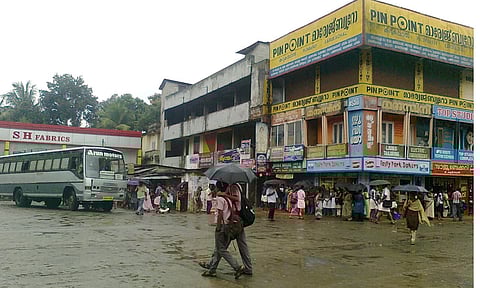 private bus stand and people